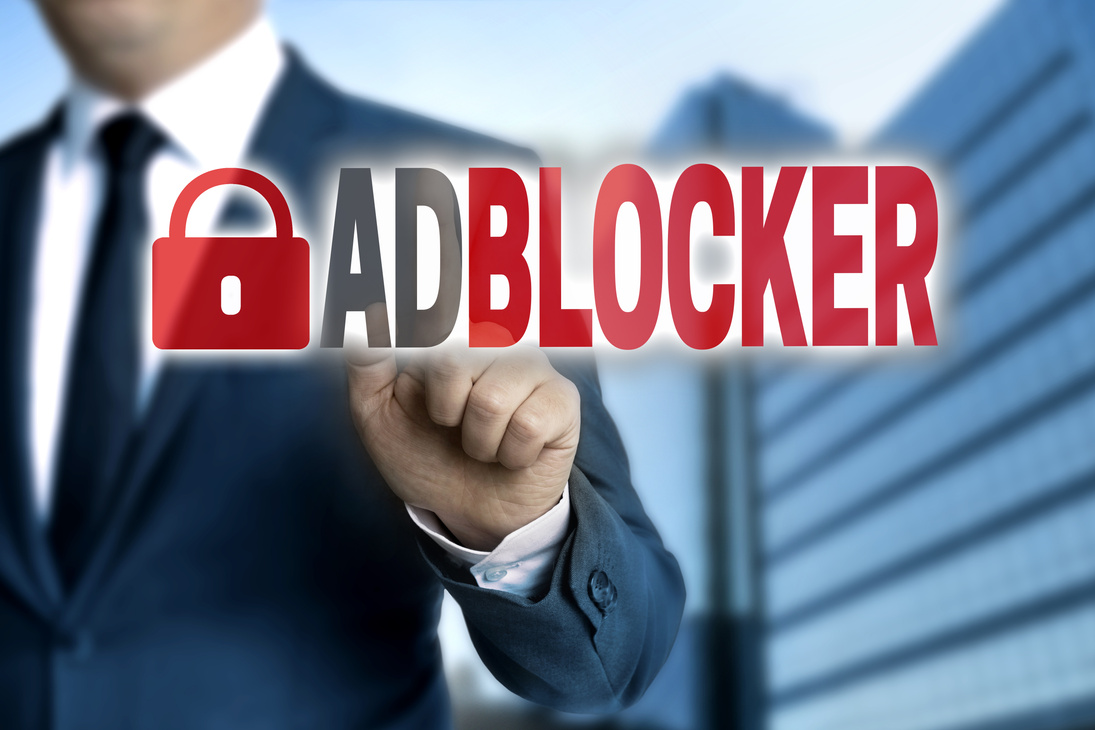 Adblocker touchscreen is operated by businessman